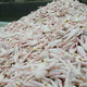 Large pile of raw chicken parts